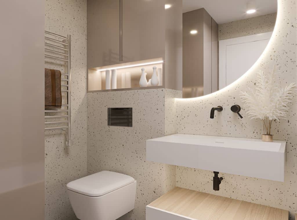 Sistema sanitario inteligente con grifos de sensor y sanitarios de bajo consumo en un baño moderno. 